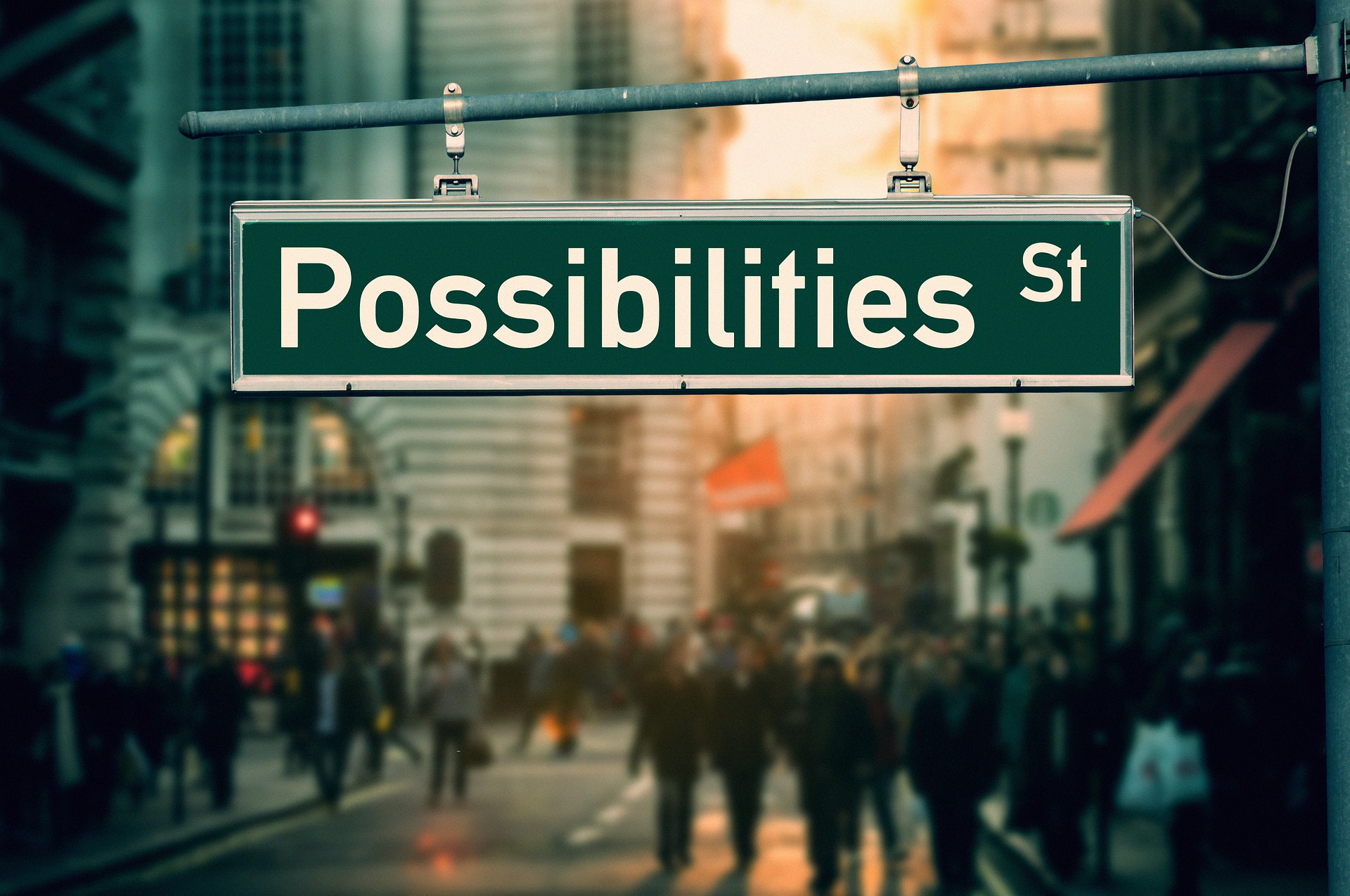 street sign on a busy street showing possibilities representing a opportunity mindset